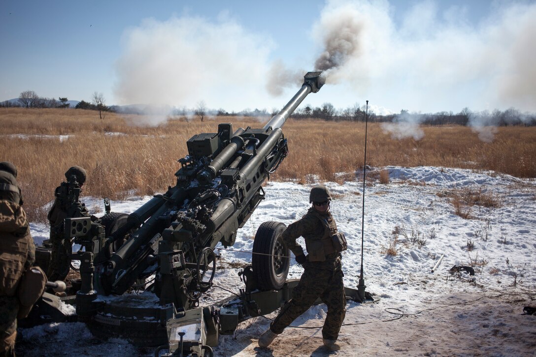 Marines with Battery A fire a round from an M777A2 lightweight 155 mm howitzer January 22 during Artillery Relocation Training Program 13-4. During ARTP, Marines with Batteries A and L fired 1900 rounds and expended over 12,800 gallons of fuel transporting personnel and equipment throughout the North Fuji Maneuver Area’s 12,000 acres. Battery A is with 1st Battalion, 12th Marine Regiment, stationed at Marine Corps Base Hawaii, and Battery L is with 3rd Battalion, 12th Marines, stationed in Marine Corps Air Ground Combat Center Twentynine Palms, Calif. Both batteries are currently assigned to 3rd Battalion, 12th Marines, 3rd Marine Division, III Marine Expeditionary Force, under the unit deployment program. (U. S. Marine Corps photo by Sgt. Brian A. Marion/Released)