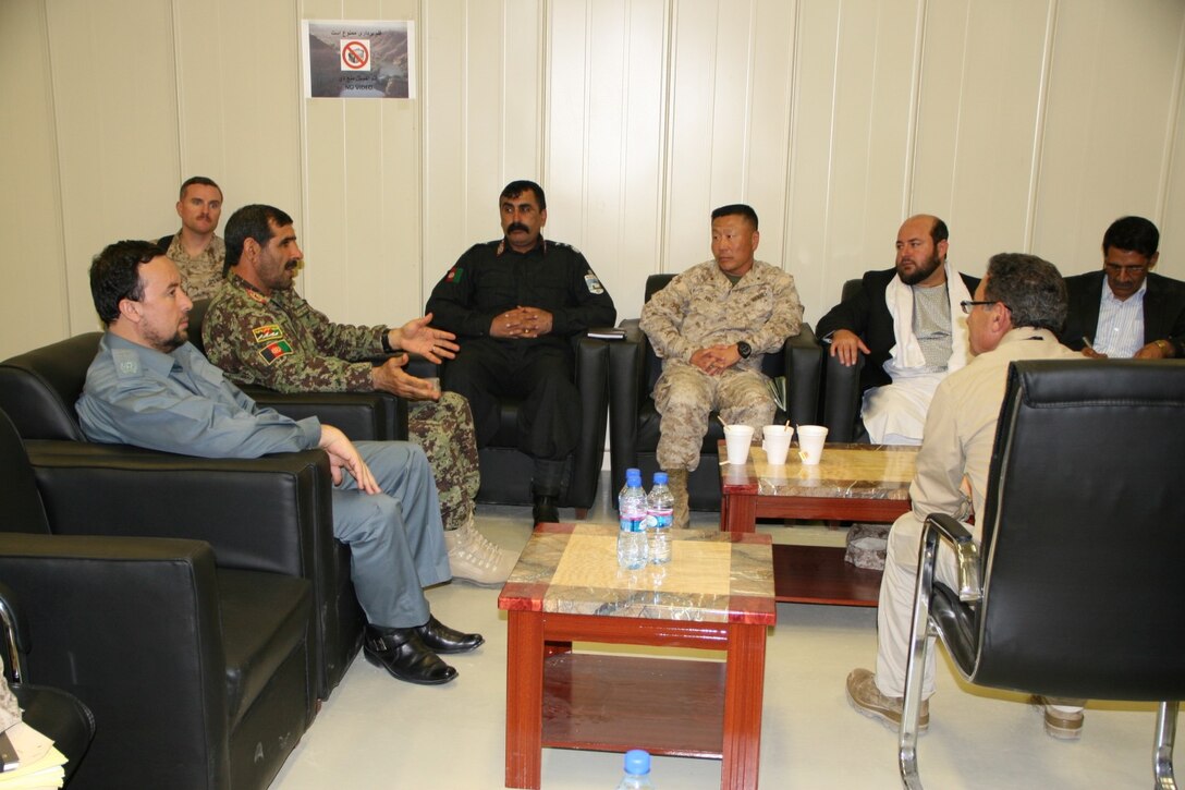 Brigadier Gen. Daniel D. Yoo, center, commanding general, Regional Command (Southwest), listens to Afghan National Army Maj. Gen. Sayeed Malook, left, address Amir Mohammad Akhundzada, center-right, Nimroz provincial governor, and Maj. Gen. Abdul Qayum Baqazai, center-left, Helmand provincial chief of police, aboard Camp Leatherneck, Helmand province, Afghanistan, March 29, 2014. Brigadier Gen. Yoo, Marine Expeditionary Brigade - Afghanistan staff, ANA officials as well as both Nimroz and Helmand provincial leaders, met during a regional security shura held to discuss the upcoming presidential elections and security measures being emplaced to ensure the local people are kept safe.