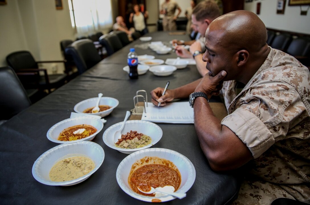 Master Gunnery Sgt. Torain Kelley, operations chief, 15th Marine Expeditionary Unit, judges the unit’s chili cook off aboard Camp Pendleton, Calif., March 27, 2014. The chili was judged on temperature, spice, presentation, texture and aftertaste. (U.S. Marine Corps photo by Cpl. Emmanuel Ramos/Released)