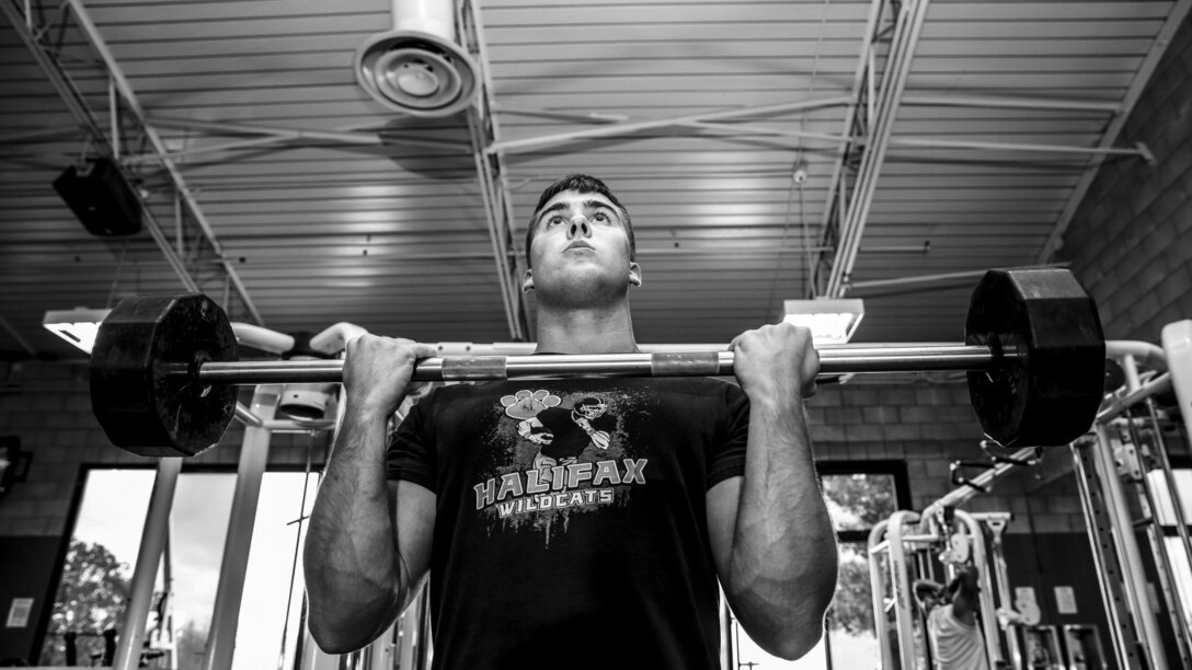 Lance Cpl. Austin Enders, intelligence specialist, 15th Marine Expeditionary Unit, works out aboard Camp Pendleton, Calif., March 27, 2014. Enders, 19, is from Halifax, Pa. and enlisted in the Marine Corps on Sept. 11, 2012 (U.S. Marine Corps photo by Cpl. Emmanuel Ramos/Released)