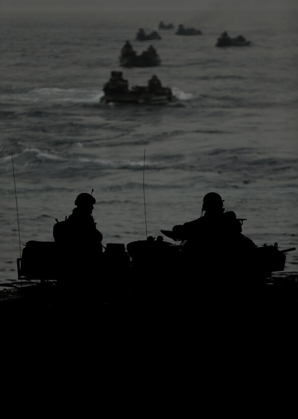 EAST CHINA SEA ABOARD USS HARPERS FERRY (LSD 49) – Marines with Amphibious Assault Vehicle Platoon, Bravo Company, Battalion Landing Team 1/4, 13th Marine Expeditionary Unit maneuver their AAV-7’s off the USS Harpers Ferry (LSD-49) conduct amphibious operations off the coast of the Republic of Korea during Exercise Ssang Yong 14, March 29. Exercise Ssang Yong is conducted annually in the Republic of Korea (ROK) to enhance the interoperability of U.S. and ROK forces by performing a full spectrum of amphibious operations while showcasing sea-based power projection in   the Pacific. (Official U.S. Marine Corps photo by Sgt. Christopher O’Quin/Released)