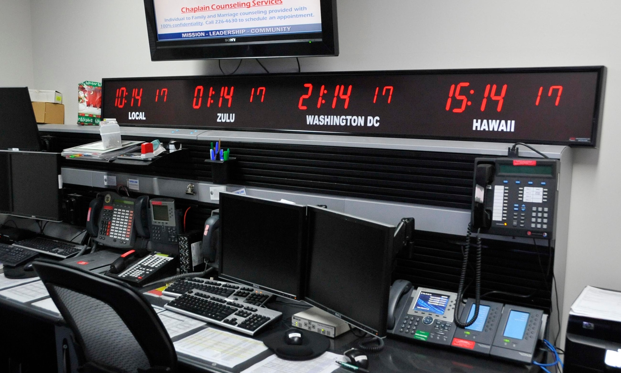 A console at the 35th Command Post building has timezones displayed to allow controllers worldwide awareness in the event of an emergency at Misawa Air Base, Japan, March 25, 2014. With this capability, the 35 CP is able to coordinate with other agencies in different countries to track the progress of aircraft.