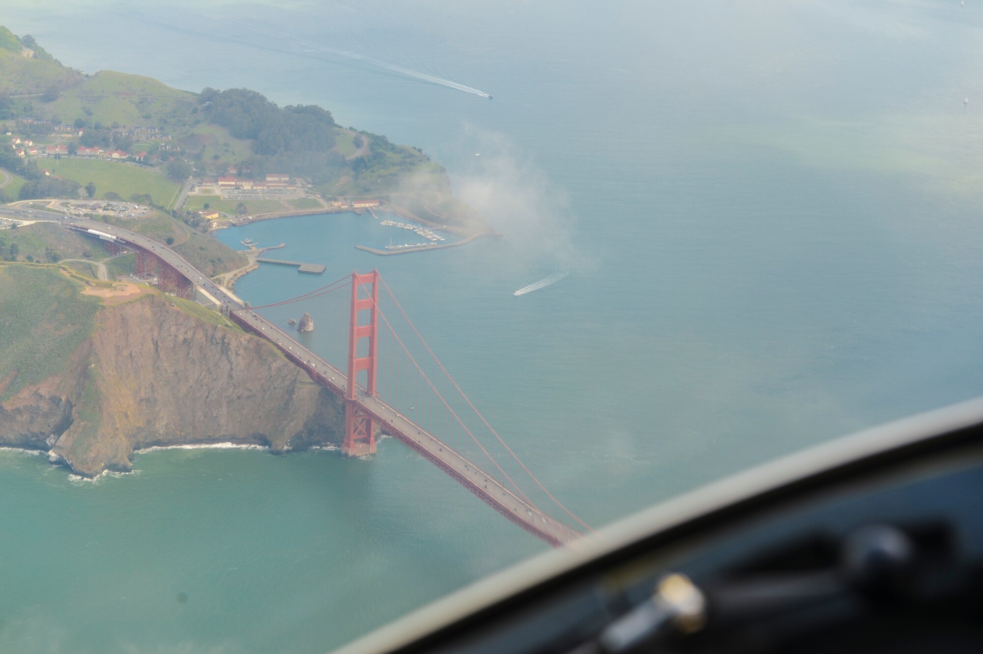 A view of the iconic Golden Gate Bridge is seen from the cockpit of a C-17 Globemaster III, March 28, 2014. Civic leaders from communities surrounding Joint Base Lewis-McChord, Wash., were able to see spectacular views as they flew over the Bay Area en route to Travis Air Force Base, Calif., on the Fly-Away Civic Leader Tour. (U.S. Air Force photo by Staff Sgt. Russ Jackson) 