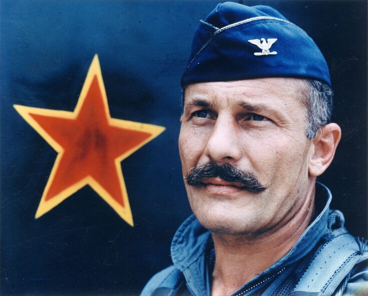 Three-time ace pilot Brig. Gen. Robin Olds (when he was a colonel) looks into the distance with the steely stare a person can only have when they know they have a mustache like that to back them up in a fight. It is uncertain which has more star power: the mustache or the actual star. (File photo)