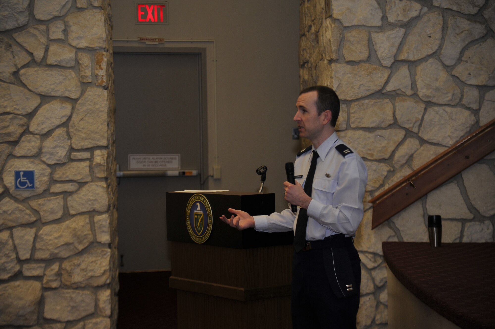 Capt. Justin Thompson speaks to members of the Retiree Information Day about legal services that Fairchild Legal office offers in Richland, Wash., March 28., 2014.  The Retiree Activities Office in Richland hosts an informational event every year for the retiree community in the Richland area. Thompson is an attorney with 92nd Air Refueling Wing legal office. (U.S. Air Force by Staff Sgt. Jordan Pollock/Released)