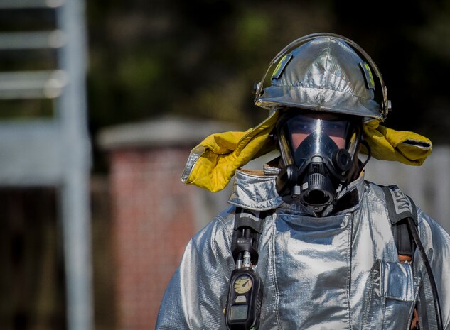 Staff Sgt. Damien Montero, 628th Civil Engineering Squadron fire fighter,  continues working during the Mass Casualty Exercise March 28, 2014, at JB Charleston – Air Base, S.C. The purpose of the exercise was to test the ability of JB Charleston first responders in the event of an emergency. (U.S. Air Force photo / Senior Airman Tom Brading)