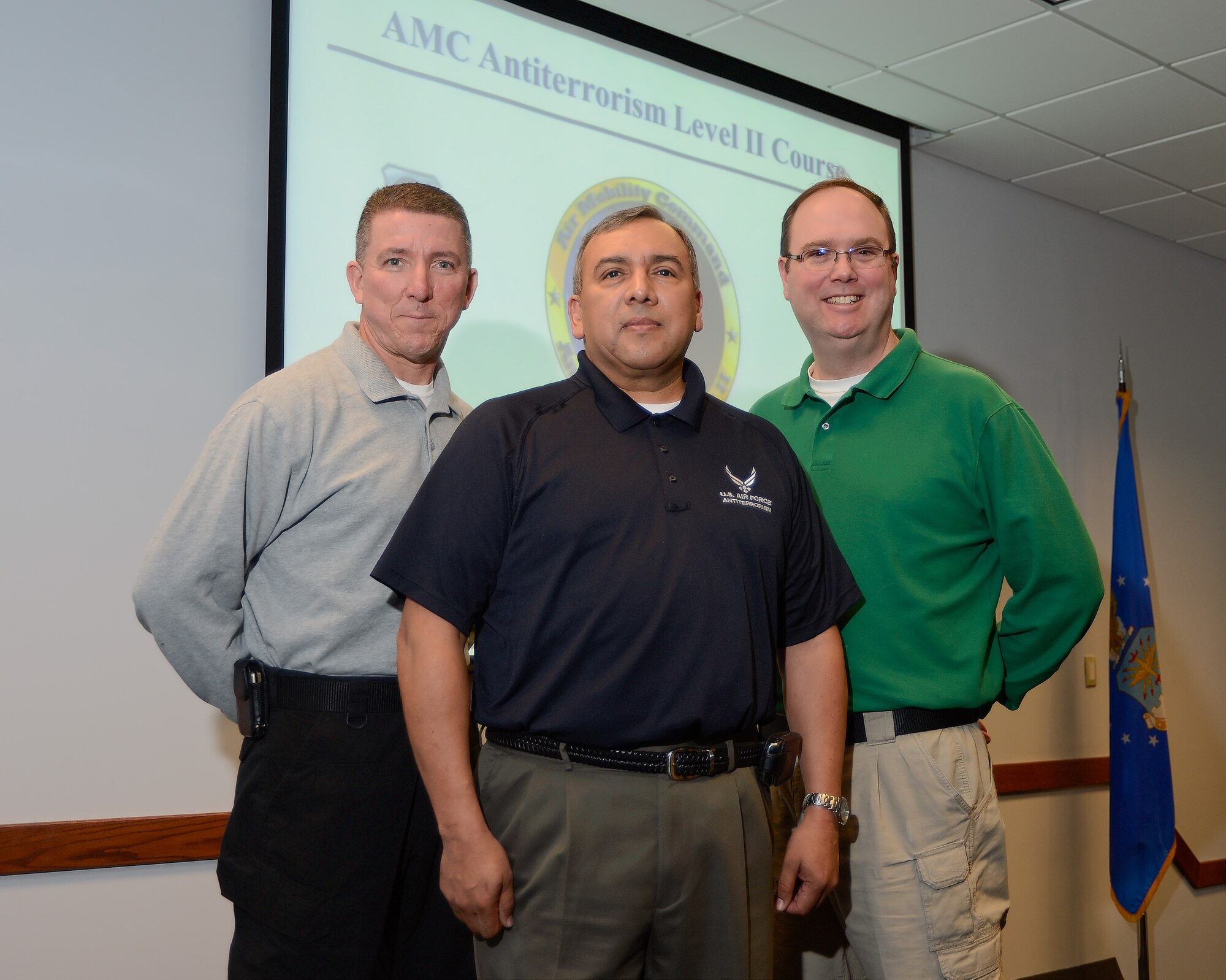 Walter Billing, left, Michael Mendoza, middle, and Derek Feny, right, make up Dover's Anti-Terrorism Office and are shown on April 1, 2014, at Dover Air Force Base, Del. The Anti-Terrorism and Information Protection function has been realigned and consolidated within the 436th SFS. (U.S. Air Force photo/Greg L. Davis)