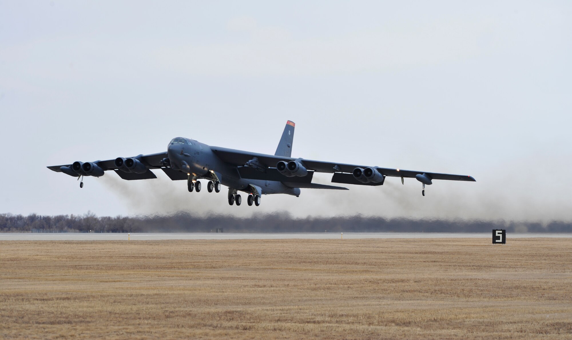 A B-52H Stratofortress takes off from Minot Air Force Base, N.D., March 27,
2014. A group of B-52s travelled to Ellsworth AFB in preparation for runway
construction that is slated to begin in early April and scheduled to be
completed by September.  (U.S. Air Force photo/Senior Airman Kristoffer
Kaubisch)
