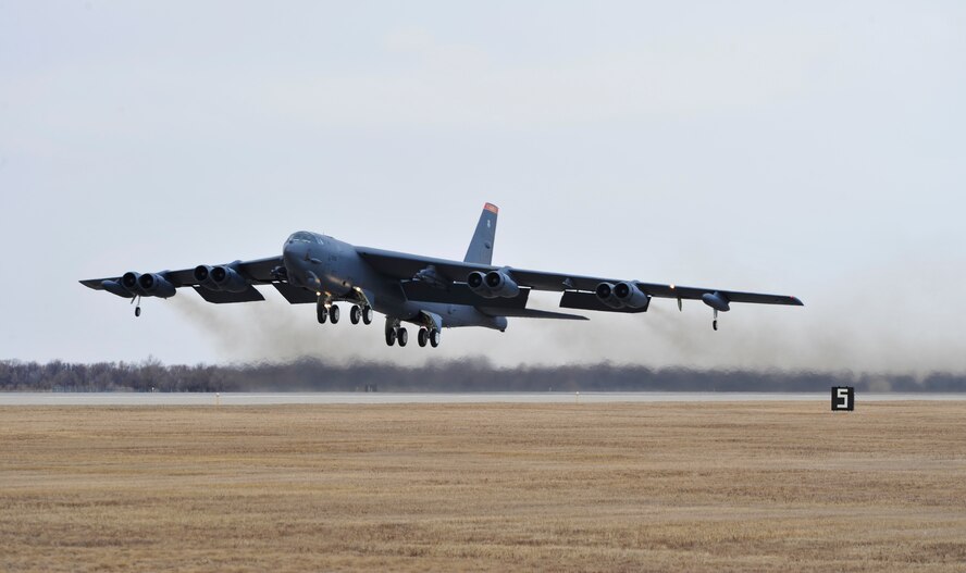 A B-52H Stratofortress takes off from Minot Air Force Base, N.D., March 27,
2014. A group of B-52s travelled to Ellsworth AFB in preparation for runway
construction that is slated to begin in early April and scheduled to be
completed by September.  (U.S. Air Force photo/Senior Airman Kristoffer
Kaubisch)
