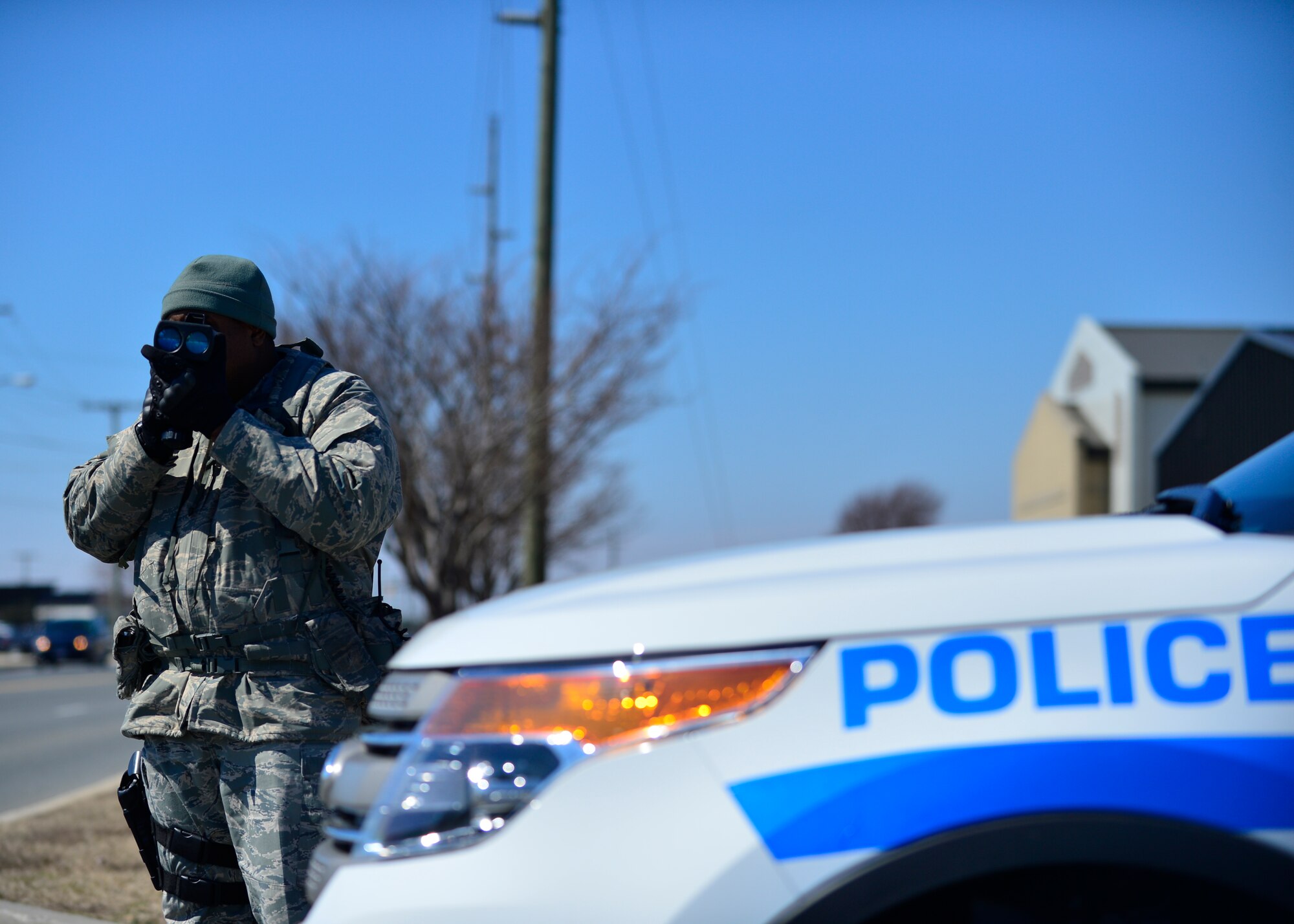 Tech. Sgt. Laurance Isaac, 436th Security Forces Squadron bravo flight chief, performs radar enforcement operations March 24, 2014, at Dover Air Force Base, Del. SFS members regularly conduct radar enforcement to ensure safe driving on Dover AFB. (U.S. Air Force/Airman 1st Class William Johnson)