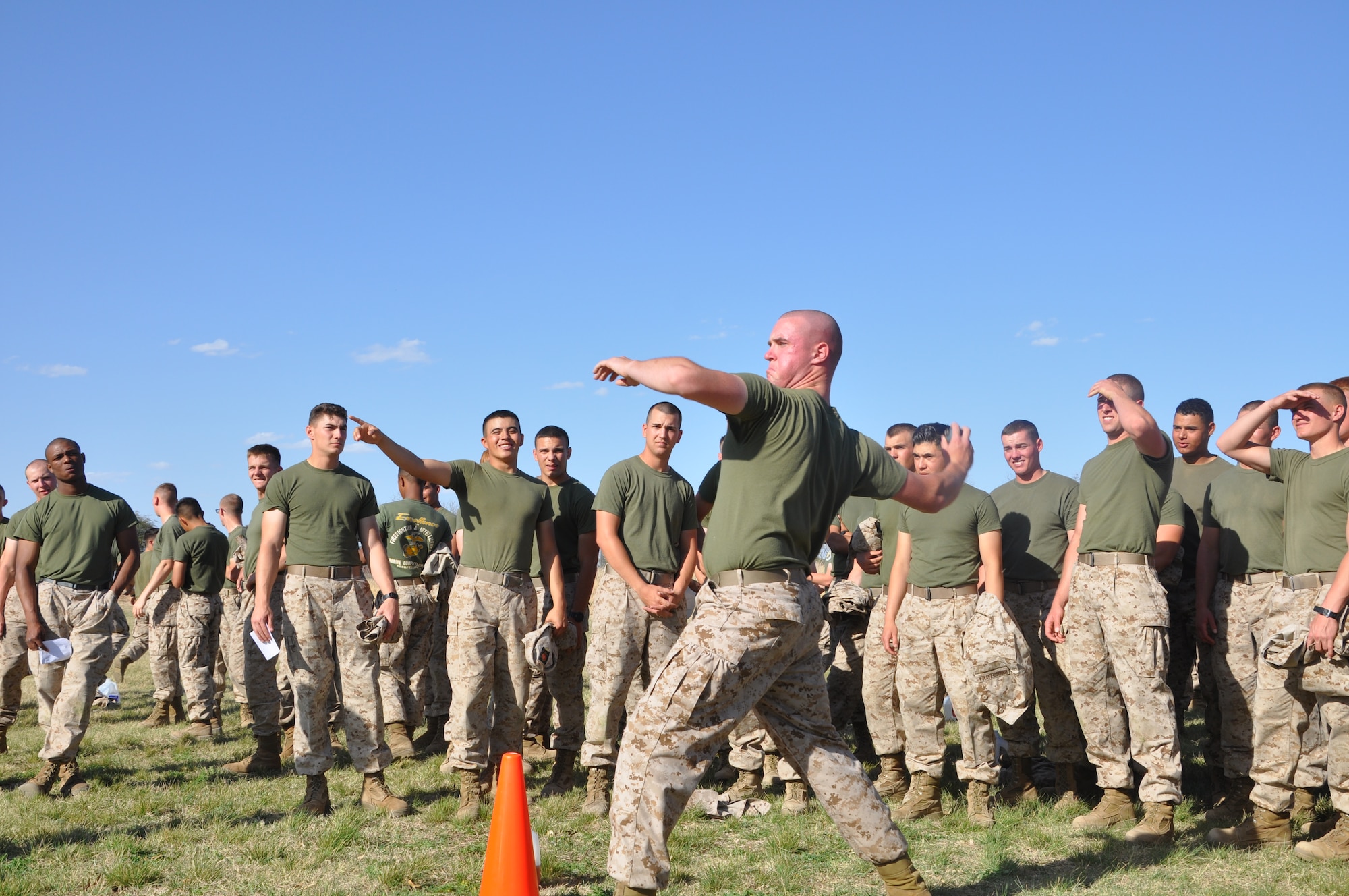 GOODFELLOW AIR FORCE BASE, Texas- Marine Corps Pfc. Robert Kelderman, Marines Corps Detachment student, prepares to throw a fake grenade during the bonus round event in the Barracks Bash here March 28. In this event, a representative from each team in the competition performed three push-ups, collected his or her grenade and threw it at a target grid 25 yards down the field, adding points to the teams score based on where the grenade landed. (U.S. Air Force photo/ Airman 1st Class Erica Rodriguez)