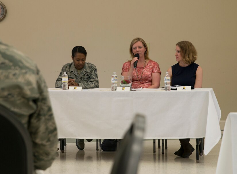 Heidi Wingo, wife of Lt. Col. Joseph Wingo, 628th Communications Squadron commander, responds to a question during the Women's History Month Luncheon Question and Answer panel March 28, 2014. Women's History Month highlights the contributions of women in history and contemporary society. It is celebrated each March in the United States, the United Kingdom and Australia, corresponding with International Women's Day. (U.S. Air Force photo/Senior Airman Ashlee Galloway)