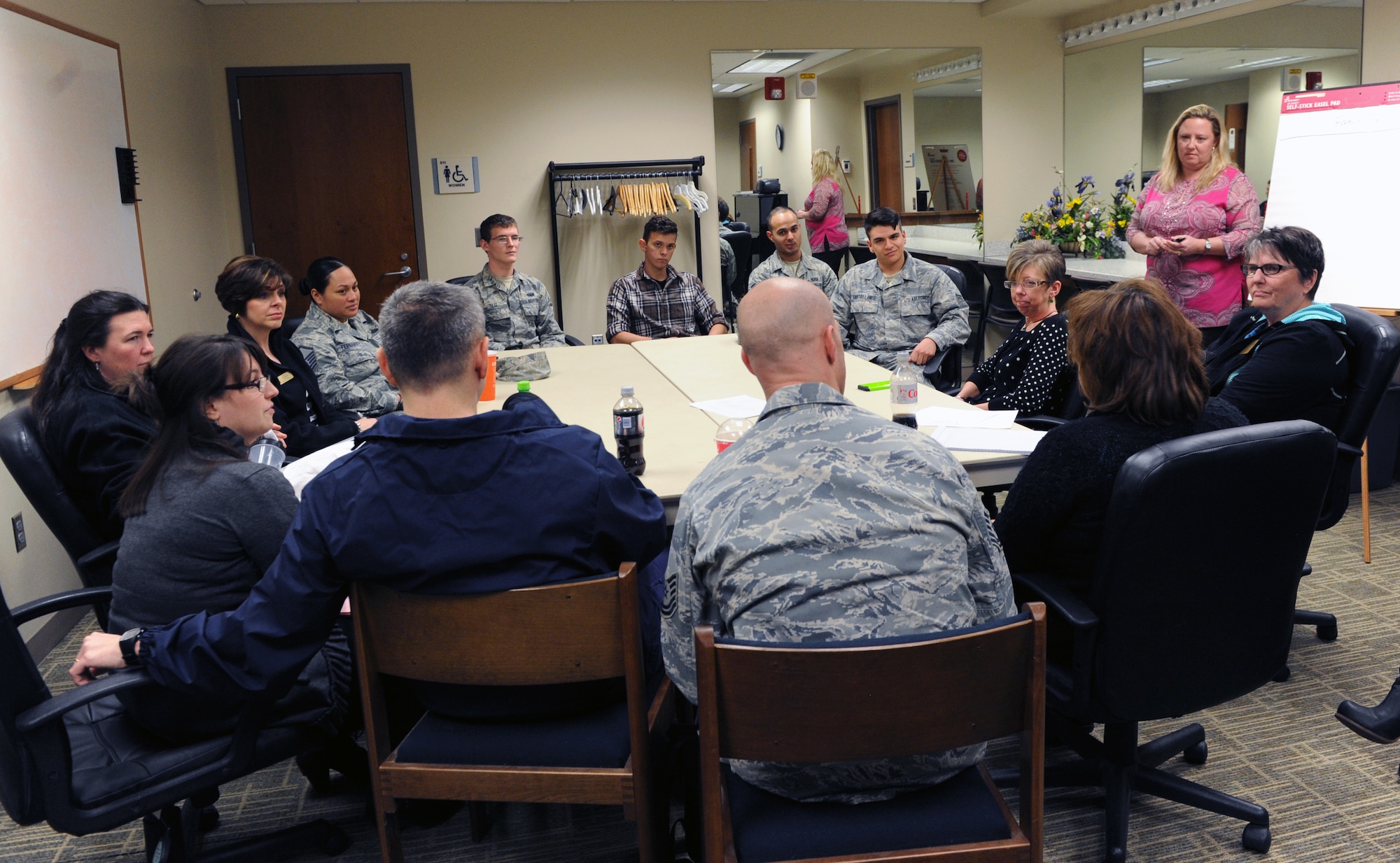 Attendees of the Caring for People forum discuss family and spouse support as one of the forum’s six working groups March 28, 2014 at the chapel on Buckley AFB, Colo. The forum was a chance for Team Buckley members to address and share opinions on issues in the local community. (U.S. Air Force photo by Airman Emily E. Amyotte/Released)
