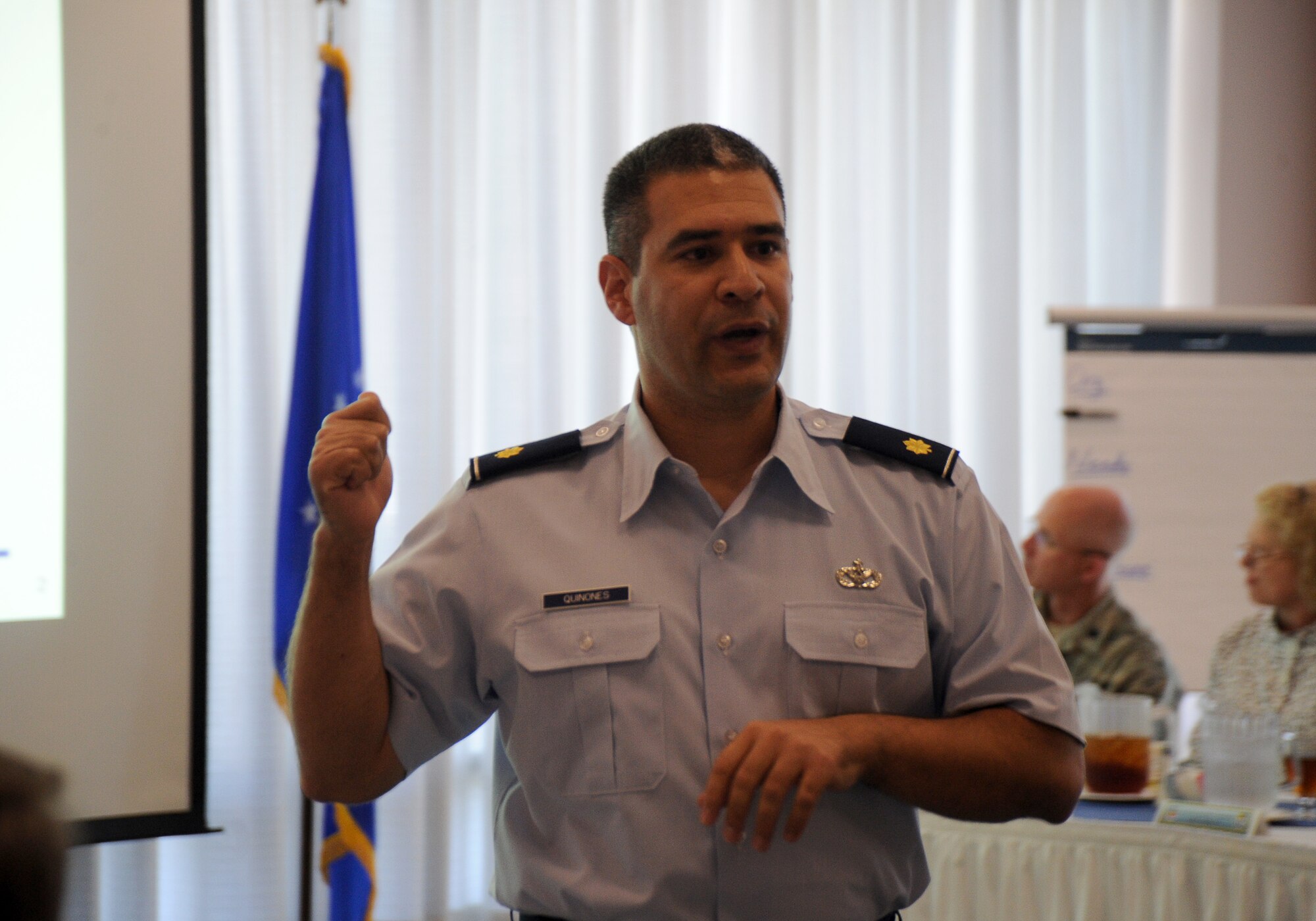 Maj. Gregg Quinones, 202nd RED HORSE operations officer, speaks to a group of 50 members from Team Tyndall and the surrounding community March 21 during the P4: Public-Public; Public-Private Partnerships initiative meeting. P4 is a way for Air Force bases and their local communities to save money by using each other’s assets creatively to solve problems. (U.S. Air Force photo by Airman 1st Class Alex Echols)