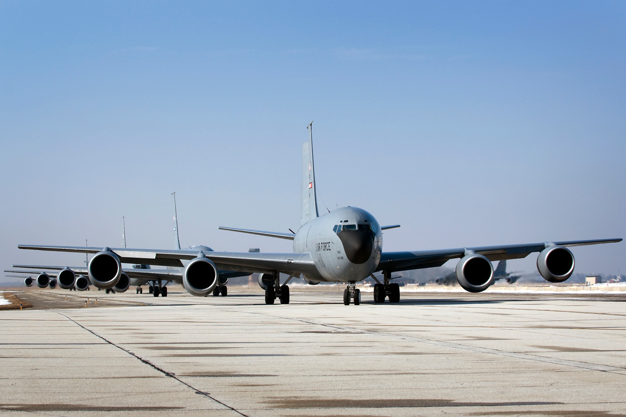 Five 434th Air Refueling Wing KC-135R Stratotankers head down a taxiway at Grissom Air Reserve Base, Ind., March 9, 2014. During the 434th ARW's March unit training assembly, the unit held a strategic warfare exercise, executing various response, mobility, and command and control procedures in response to a simulated global threat, which culminated in 10 Stratotankers taking off in two five-ship formations. (U.S. Air Force photo/Tech. Sgt. Mark R. W. Orders-Woempner)
