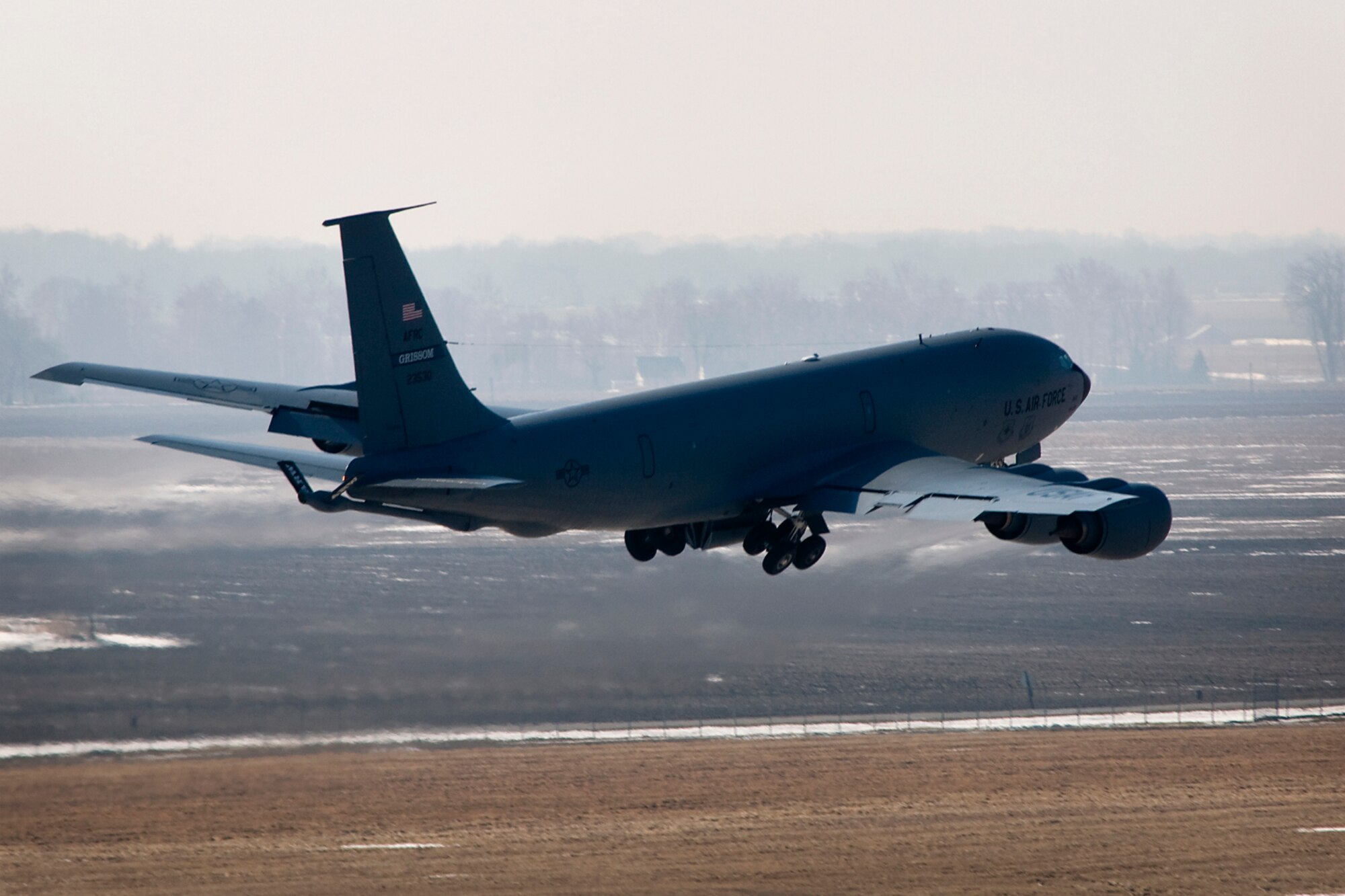 A KC-135R Stratotanker takes off from Grissom Air Reserve Base, Ind., March 9, 2014. During the 434th Air Refueling Wing's March unit training assembly, the unit held a strategic warfare exercise, executing various response, mobility, and command and control procedures in response to a simulated global threat, which culminated in 10 Stratotankers taking off in two five-ship formations. (U.S. Air Force photo/Staff Sgt. Andrew McLaughlin)
