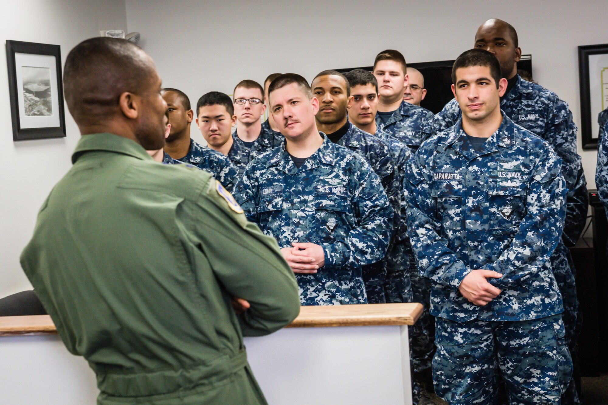 Lt. Gen. Darren W. McDew,18th Air Force commander, visits with Naval personnel from the 305th Operational Support Squadron Mar. 27, 2014, at Joint Base McGuire-Dix-Lakehurst, N.J.  The visit was part of McDew’s two-day tour of JB MDL where he visited the 305th Air Mobility Wing and various mission partners throughout JB MDL.  (U.S. Air Force photo by Russ Meseroll/Released)