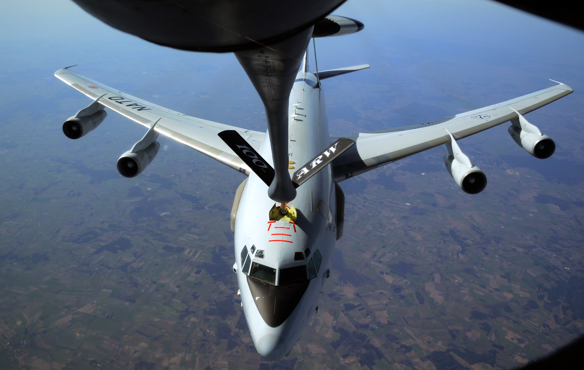 A NATO E-3 Sentry receives fuel from a 100th Air Refueling Wing KC-135 Stratotanker during a sortie March 21, 2014, over Eastern Europe. The E-3 provides intelligence gathering capabilities and mobile radar. (U.S. Air Force photo by Airman 1st Class Dillon Johnston/Released)