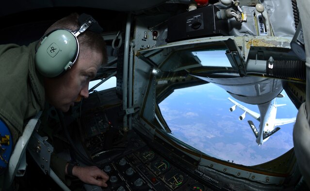 Then U.S. Air Force Staff Sgt. Eric Sonnenberg, 351st Air Refueling Squadron boom operator from Belen, N.M., guides a boom toward a NATO E-3 Sentry March 21, 2014, during a sortie over Eastern Europe. Sonnenberg was promoted through the Stripes for Exceptional Airman program Dec. 17, 2014, by U.S. Air Force Gen. Frank Gornec, U.S. Air Forces Europe and Air Forces Africa commander. (U.S. Air Force photo by Airman 1st Class Dillon Johnston/Released)