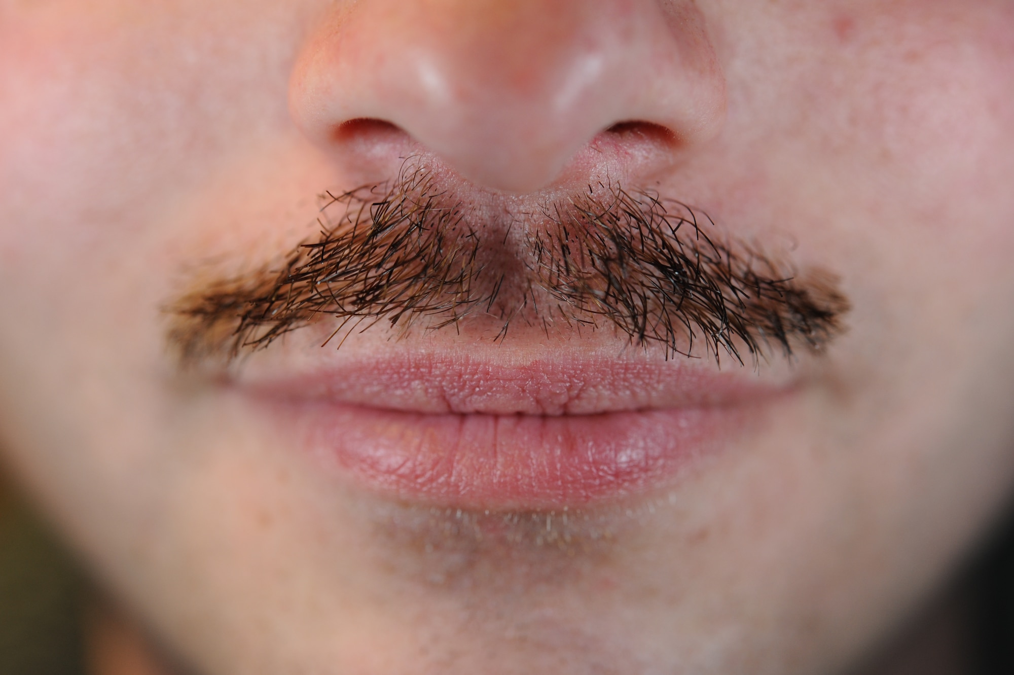 Staff Sgt. Jesse Bechtel, 436th Security Forces Squadron physical security, participated in Mustache March March 27, 2014, at Dover Air Force Base, Del. Airmen from every unit on Dover AFB could be spotted wearing a March mustache. (U.S. Air Force photo/Airman 1st Class Zachary Cacicia)