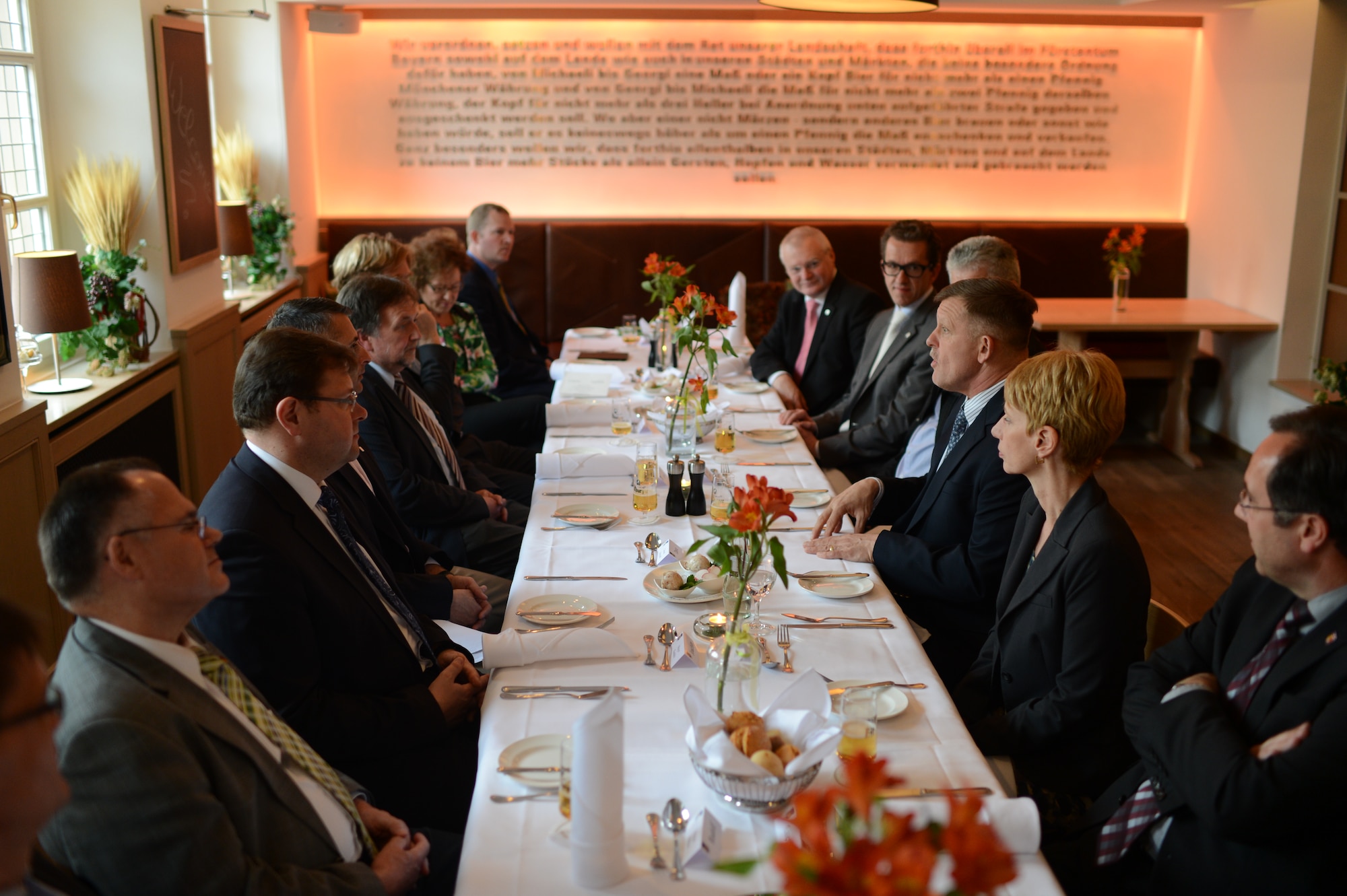 U.S. Air Force Gen. Frank Gorenc, U.S. Air Forces in Europe and Air Forces
Africa commander, discusses topics with 52nd Fighter Wing leadership and
local civic leaders at a dinner in Bitburg, Germany, March 31, 2014. 
Gorenc personally invited the local leaders to dinner to
speak about the important role they play in the Spangdahlem
community. (U.S. Air Force photo by Senior Airman Gustavo Castillo/Released)
