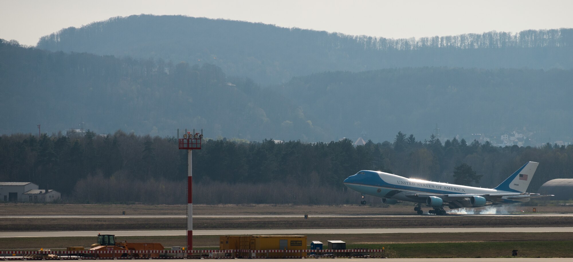 Air Force One touches down on the flight line March 29, 2014, at Ramstein Air Base, Germany. After Air Force One landed, President Barack Obama exited aircraft, spoke with Gen. Frank Gorenc, U.S. Air Forces in Europe and Air Forces Africa commander, and Brig. Gen. Patrick X. Mordente, 86th Airlift Wing commander, and visited wounded warriors from Landstuhl Regional Medical Center. (U.S. Air Force photo/Senior Airman Jonathan Stefanko)
