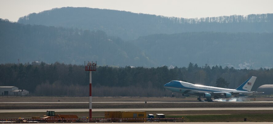 Air Force One touches down on the flight line March 29, 2014, at Ramstein Air Base, Germany. After Air Force One landed, President Barack Obama exited aircraft, spoke with Gen. Frank Gorenc, U.S. Air Forces in Europe and Air Forces Africa commander, and Brig. Gen. Patrick X. Mordente, 86th Airlift Wing commander, and visited wounded warriors from Landstuhl Regional Medical Center. (U.S. Air Force photo/Senior Airman Jonathan Stefanko)
