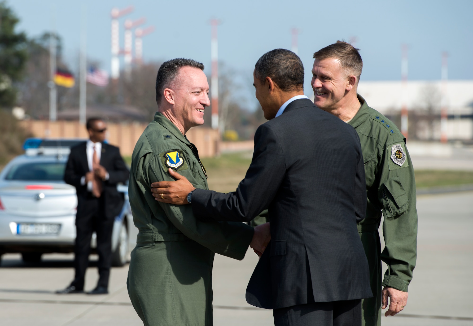 President Barack Obama shakes hands with Brig. Gen. Patrick X. Mordente, 86th Airlift Wing commander, March 29, 2014, at Ramstein Air Base, Germany. During his stop, Obama visited wounded warriors from Landstuhl Regional Medical Center. (U.S. Air Force photo/Senior Airman Damon Kasberg)