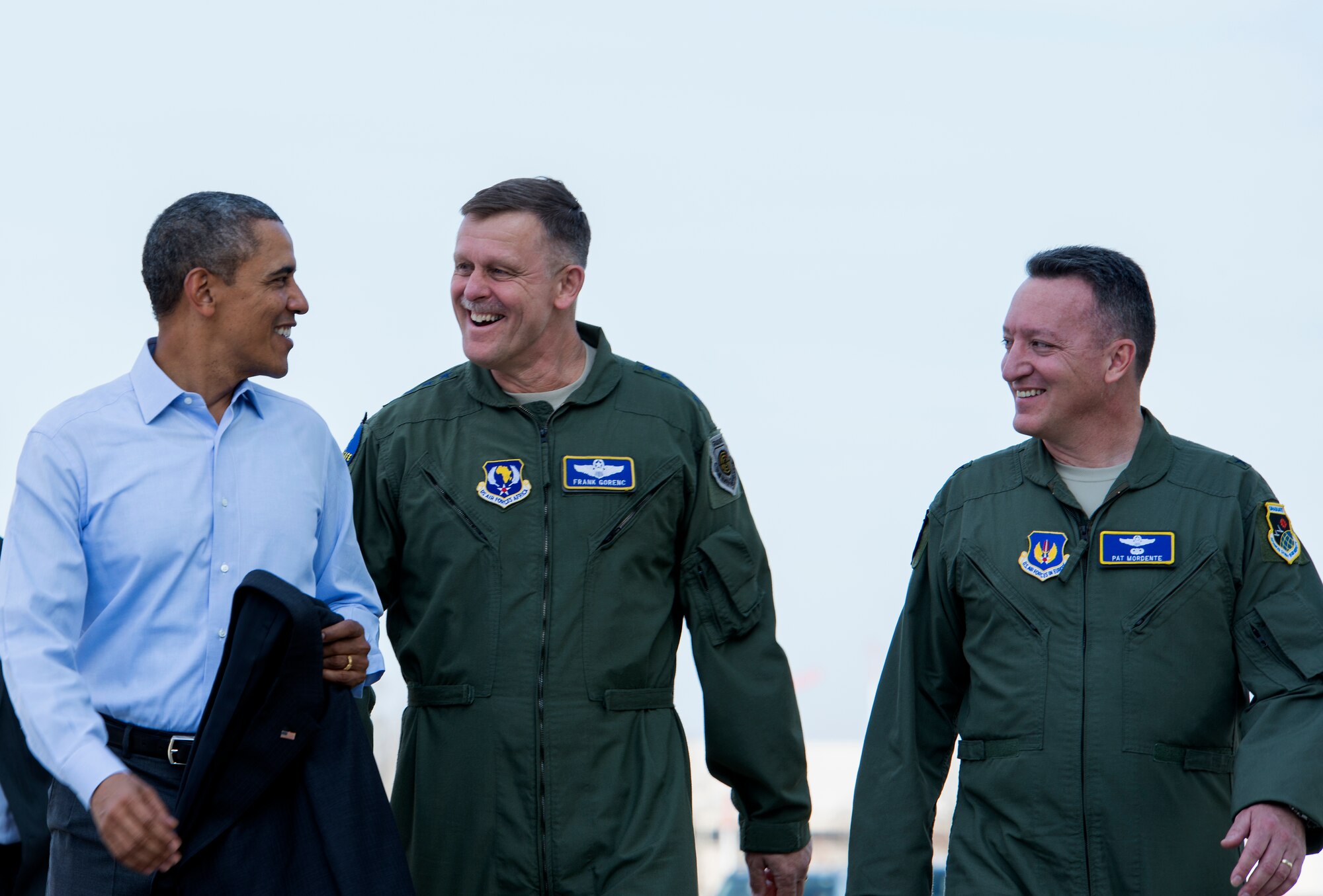President Barack Obama speaks with Gen. Frank Gorenc (middle), U.S. Air Forces in Europe and Air Forces Africa commander and Brig. Gen. Patrick X. Mordente, 86th Airlift Wing commander, March 29, 2014, at Ramstein Air Base, Germany. During his stop, Obama visited wounded warriors from Landstuhl Regional Medical Center. (U.S. Air Force photo/Senior Airman Damon Kasberg)