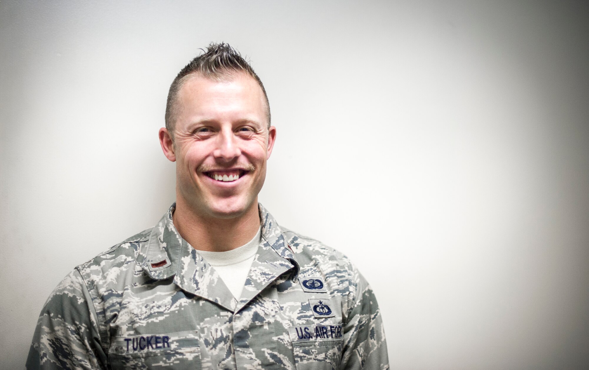 2nd Lt. Dylan Tucker, 374th Comptroller Squadron, flight commander, participates in mustache March at Yokota Air Base, Japan, March 28, 2014. Mustache March is annual event occurring in the month of March, where men in the United States Air Force grow mustaches to honor Air Force legend General Robin Olds. (U.S. Air Force photo by Staff Sgt. Stacy Moless)