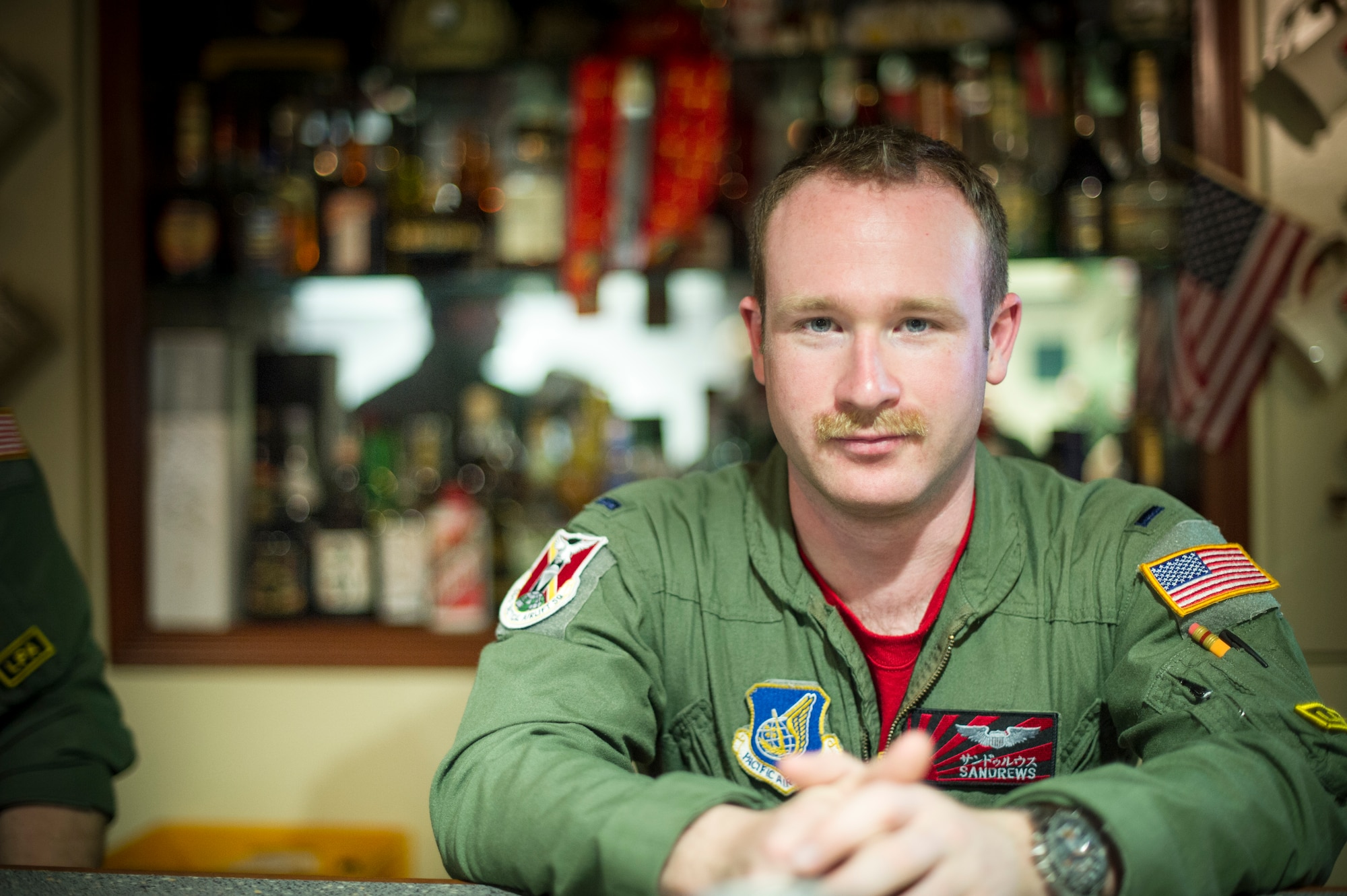 1st Lt. Sean Andrews, 36th Airlift Squadron, pilot, participates in mustache March at Yokota Air Base, Japan, March 28, 2014. Mustache March is annual event occurring in the month of March, where men in the United States Air Force grow mustaches to honor Air Force legend General Robin Olds. (U.S. Air Force photo by Staff Sgt. Stacy Moless)