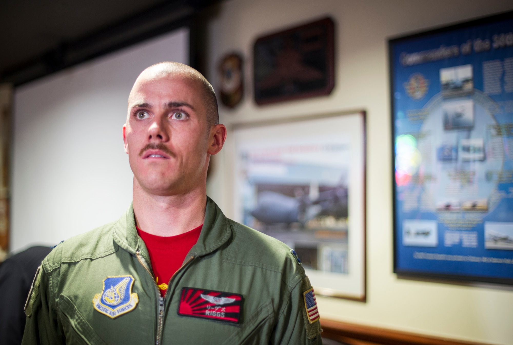 Capt. Matthieu Rigollet,  36th Airlift Squadron, flight commander, participates in mustache March at Yokota Air Base, Japan, March 28, 2014. Mustache March is annual event occurring in the month of March, where men in the United States Air Force grow mustaches to honor Air Force legend General Robin Olds. (U.S. Air Force photo by Staff Sgt. Stacy Moless)
