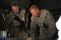 U.S. Marine Corps Capt. Paul D. Haagenson, commander of C Company, 1st battalion, 9th Marine Regiment, gives U.S. Marine Corps Lt. Gen. Robert Neller, commanding general of Marine Corps Forces Central Command, a brief aboard Forward Operating Base (FOB) Boldak in Helmand province, Afghanistan. Neller was visiting U.S. Marines and Sailors deployed in Helmand to review current plans, and retrograde operations.
(Official U.S. Marine Corps photo by Lance Cpl. Darien J. Bjorndal, Marine Expeditionary Brigade Afghanistan/ Not Released)