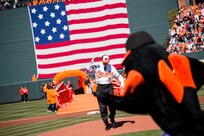 Vice Chairman of the Joint Chiefs of Staff Adm. James A. Winnefeld, Jr. attends the Baltimore Orioles' opening day game against the defending World Series Champions the Boston Red Sox, at Camden Yards in Baltimore, Mar. 31, 2014. Adm. Winnefeld was invited to throw out the ceremonial first pitch at the military-themed game.