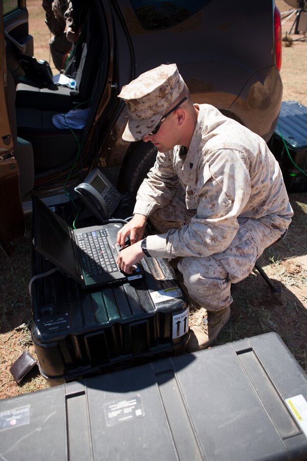 U.S. Marine Corps Cpl. Brandon R. Ikenberry, 2nd Marine Expeditionary Brigade, II Marine Expeditionary Force works on the rapid response kit during exercise African Lion 2014 on Tifnit Royal Moroccan Armed Forces Base in Agadir, Morocco, Mar. 29, 2014. African Lion is conducted as a combined-joint exercise between the Kingdom of Morocco and the U.S. Forces to strengthen relationships and military operability in the region.
