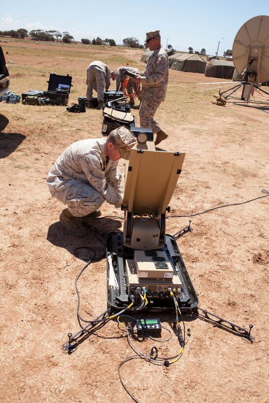 U.S. Marines with Satellite Operations, 2nd Marine Expeditionary Brigade, II Marine Expeditionary Force take apart a Rapid Response Kit during execrise African Lion 2014 on Tifnit Royal Moroccan Armed Forces Base in Agadir, Morocco, Mar. 29, 2014. African Lion is conducted as a combined joint exercise between the Kingdom of Morocco and the U.S. Forces to strengthen relationships and military operability in the region.