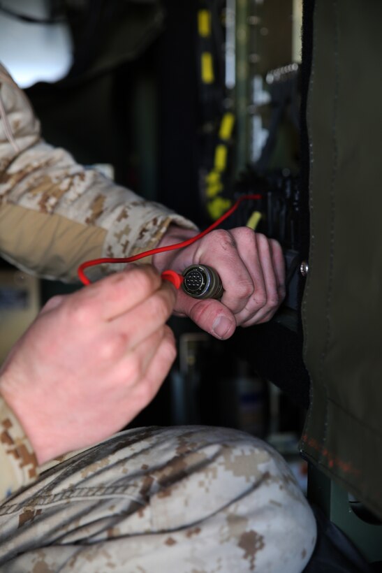 Lance Cpl. Benjamin C. Foster, 21, a satellite communications technician with 2nd Marine Expeditionary Brigade and Cincinnati, Ohio, native, conducts a pin test on the AN/TSC-156C Phoenix Satellite System, March 31, 2014. The pin test is a procedure to troubleshoot connection problems in order to ensure continuous communication service. Marines and sailors of 2nd MEB are currently participating in Exercise African Lion 14, which is an annually scheduled, multi-lateral and combined-joint exercise between the Kingdom of Morocco, the U.S. and other partner nations, and is designed to strengthen relationships in the region by increasing understanding of each nation’s military capabilities.