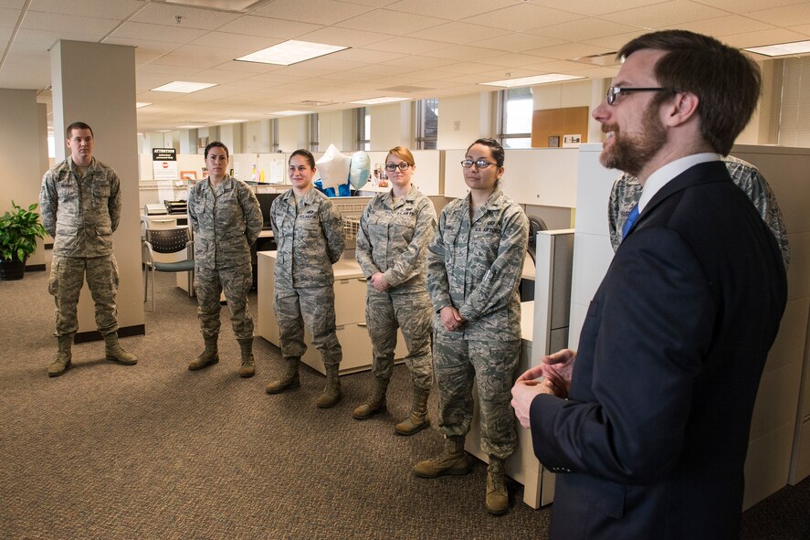Dr. Jamie Morin, the Assistant Secretary of the Air Force for Financial Management and Comptroller, visits with members of the 62nd Comptroller Squadron April 2, 2014, at Joint Base Lewis-McChord, Wash. Morin visited McChord to oversee the implementation of the Defense Enterprise Accounting and Management System, an audit readiness financial management system. (U.S. Air Force photo by Tech. Sgt. Sean Tobin)