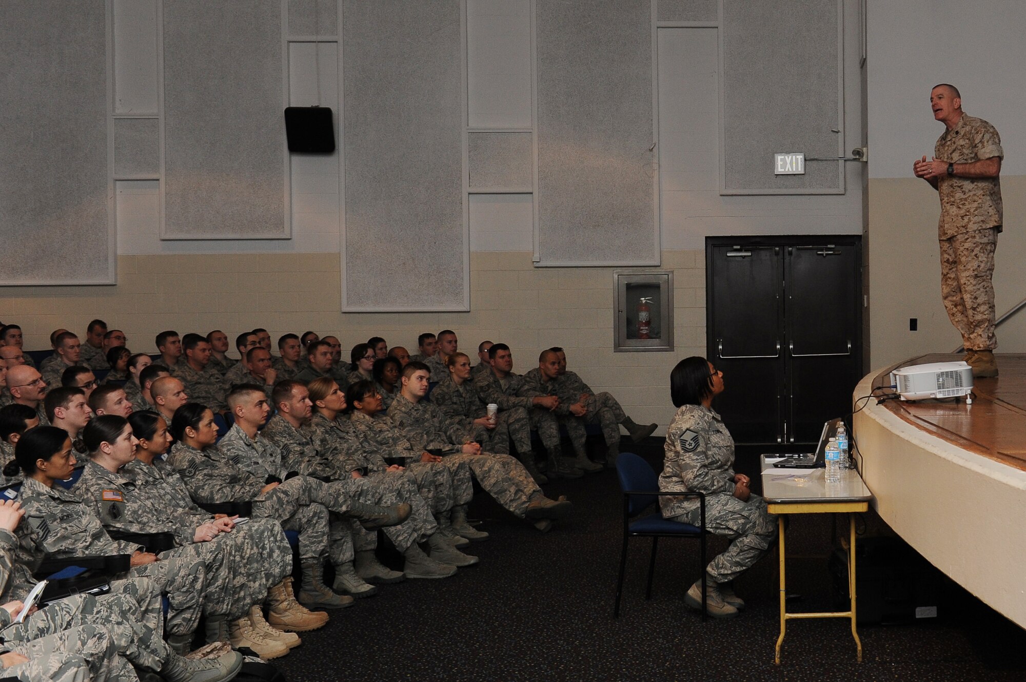 Marine Sgt. Maj. Bryan Battaglia speaks with Airmen at the Library Auditorium, March 28, 2014, Scott Air Force Base, Ill. Battaglia spoke about his book, "The Noncommissioned Officer and Petty Officer: The Backbone of the Armed Forces," and also answered questions from servicemembers. Battaglia is the Senior Enlisted Advisor to the Chairman of the Joint Chiefs of Staff. (U.S. Air Force photo/Airman 1st Class Megan Friedl)