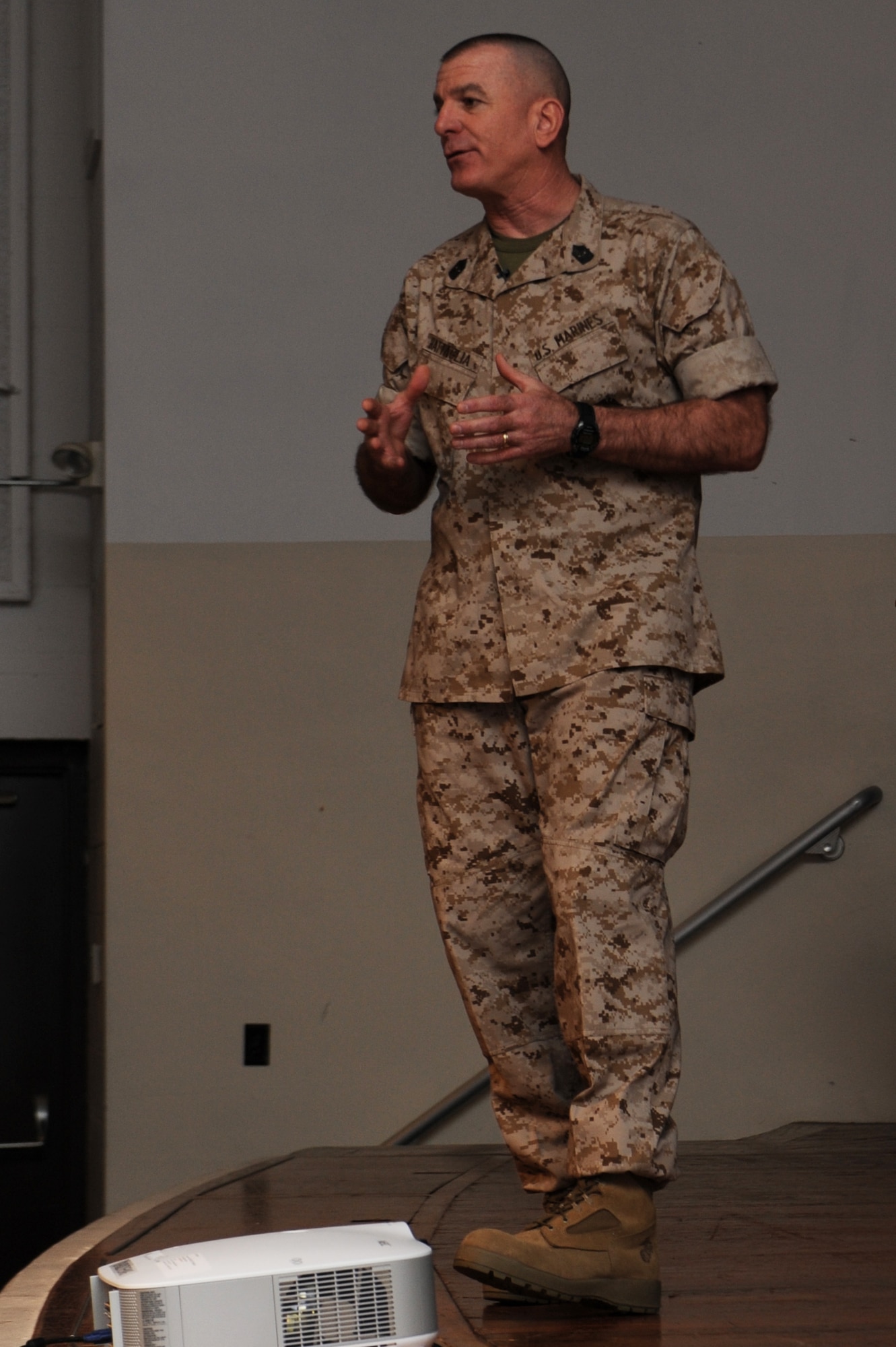 Marine Sgt. Maj. Bryan Battaglia speaks with Airmen at the Library Auditorium, March 28, 2014, Scott Air Force Base, Ill. Battaglia spoke about his book, "The Noncommissioned Officer and Petty Officer: The Backbone of the Armed Forces," and also answered questions from servicemembers. Battaglia is the Senior Enlisted Advisor to the Chairman of the Joint Chiefs of Staff. (U.S. Air Force photo/Airman 1st Class Megan Friedl)