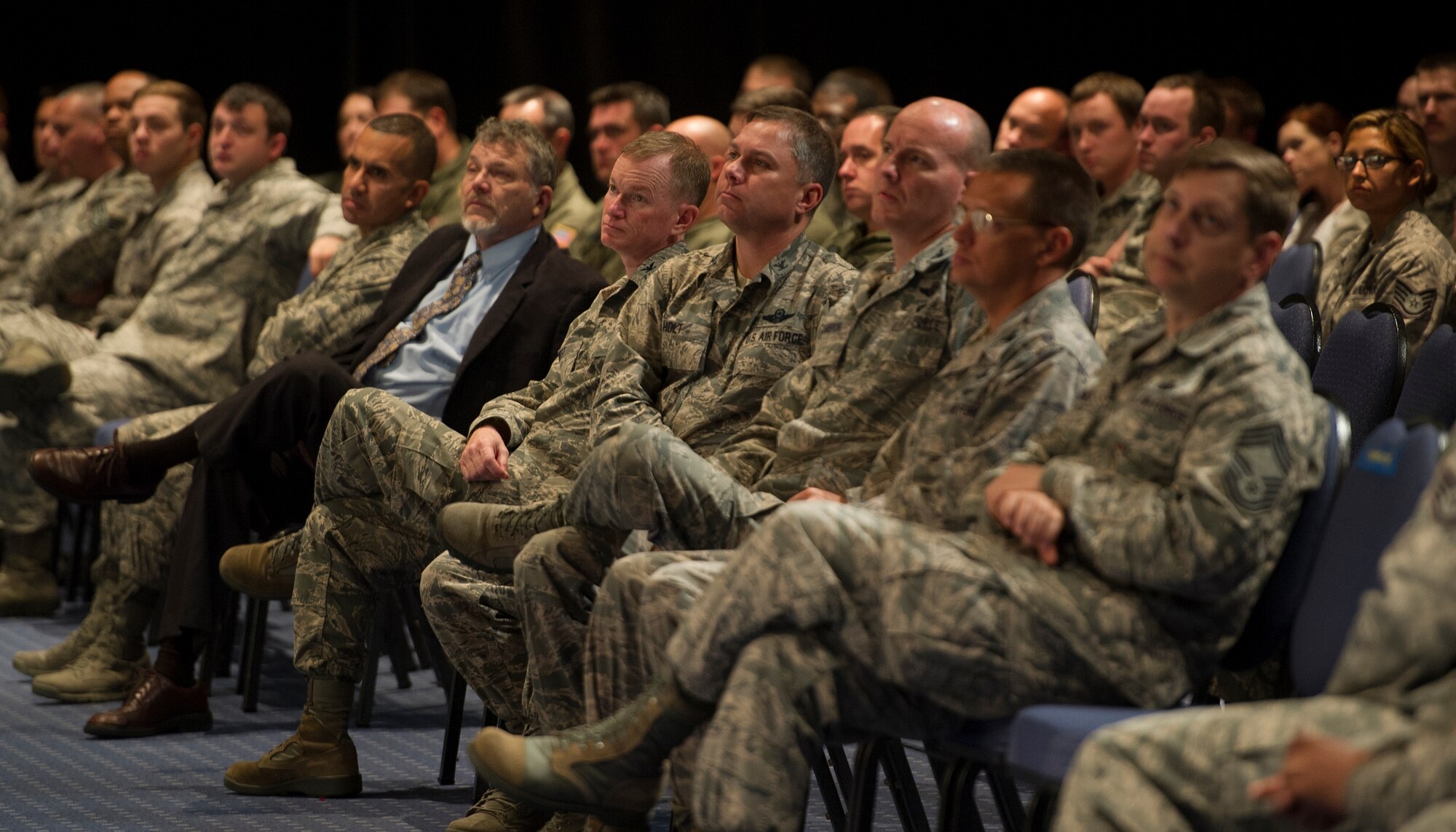 Hurlburt Field senior leaders listen to Anne Munch’s briefing on sexual assault prevention and the Un-named Conspirator at the Emerald Coast Convention Center in Fort Walton Beach, Fla., March 26, 2014. Munch is a prosecutor and advocate for victims of domestic violence, sexual assault and stalking. (U.S. Air Force photo/Airman 1st Class Jeff Parkinson)
