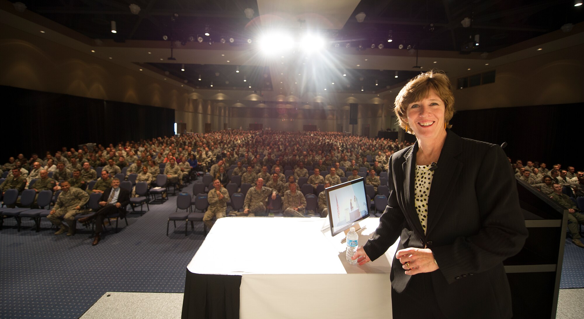 Anne Munch, a prosecutor and educator on sexual assault, domestic violence and stalking, prepares to brief more than 1,500 Air Commandos at the Emerald Coast Convention Center in Fort Walton Beach, Fla., March 26, 2014. Munch briefed more than 4,000 Air Commandos on sexual assault prevention during her two-day visit. (U.S. Air Force photo/Airman 1st Class Jeff Parkinson)