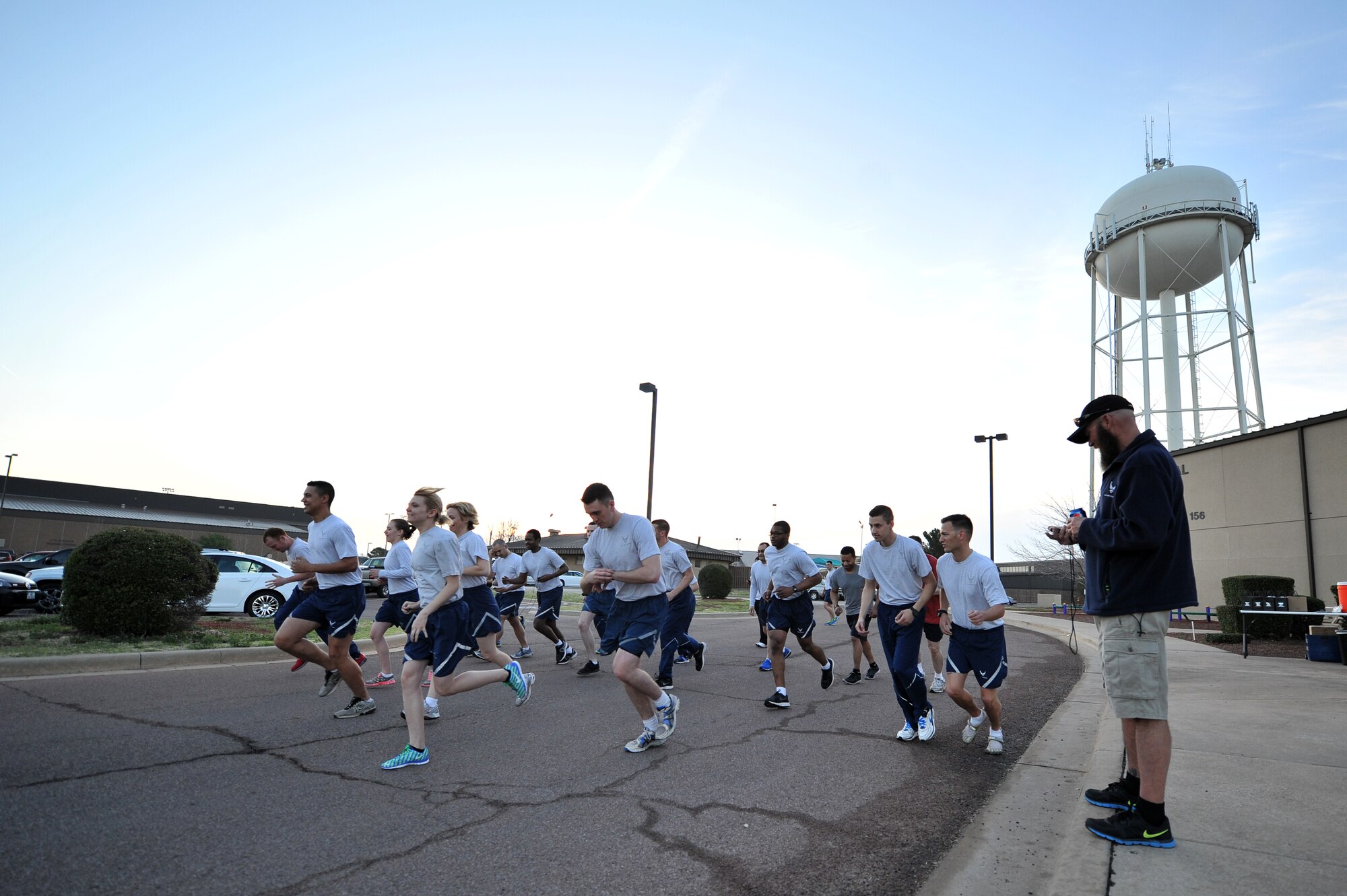 ALTUS AIR FORCE BASE, Okla. – U.S. Air Force Airmen start a five-kilometer awareness run outside the Fitness Center April 2, 2014. The run was preceded by a briefing about sexual assault prevention and raised awareness for Sexual Assault Awareness Month here at Altus AFB. (U.S. Air Force photo by Senior Airman Dillon Davis/Released)