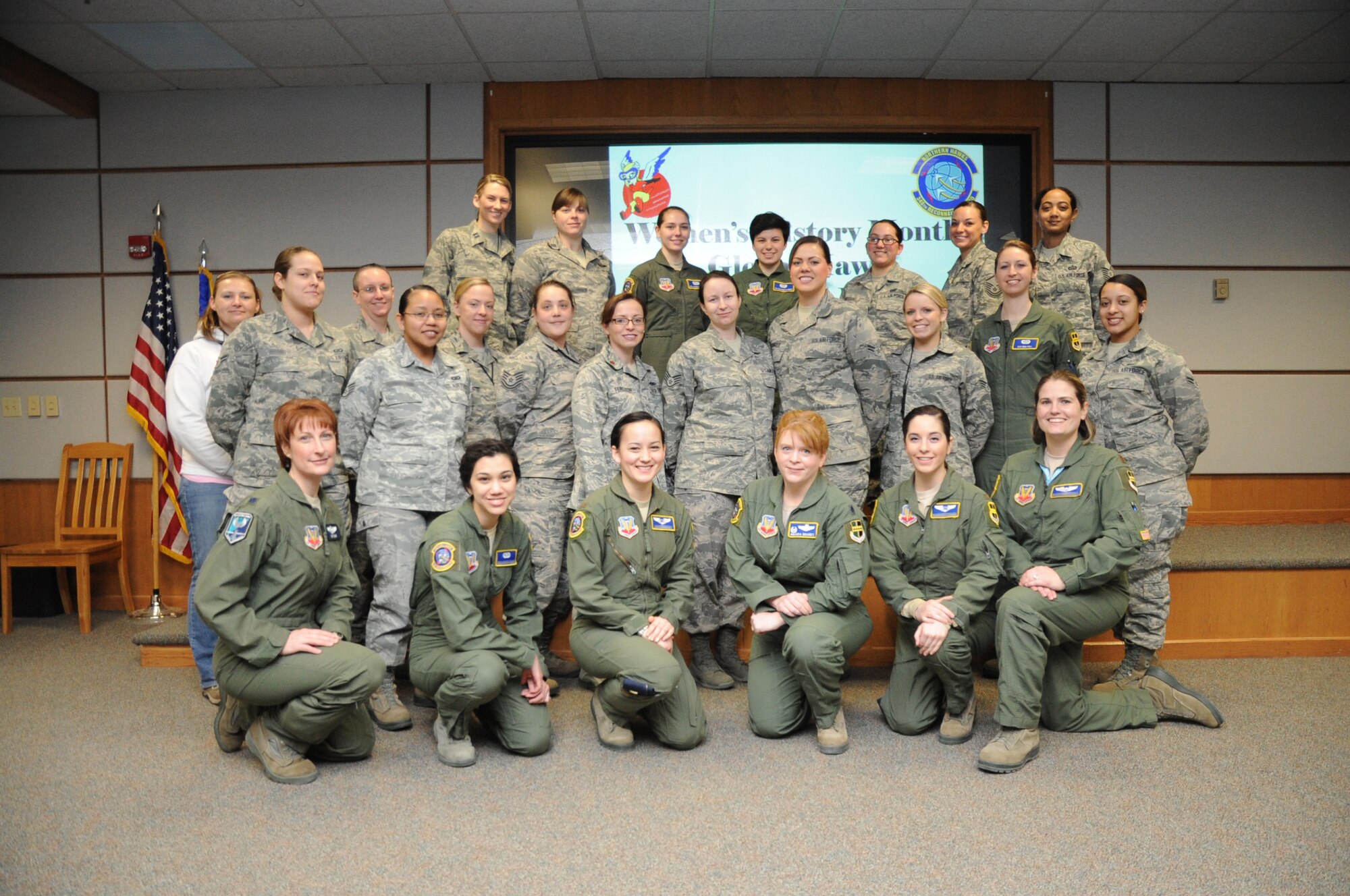 Female members of the 348th Reconnaissance Squadron and 319th Air Base Wing joined forces to set a new record for the longest flight by a military aircraft without air refueling. The record was broken March 29, 2014, with an RQ-4 Global Hawk remaining aloft for 34.3 hours. (U.S. Air Force photo illustration/Staff Sgt. David Dobrydney)