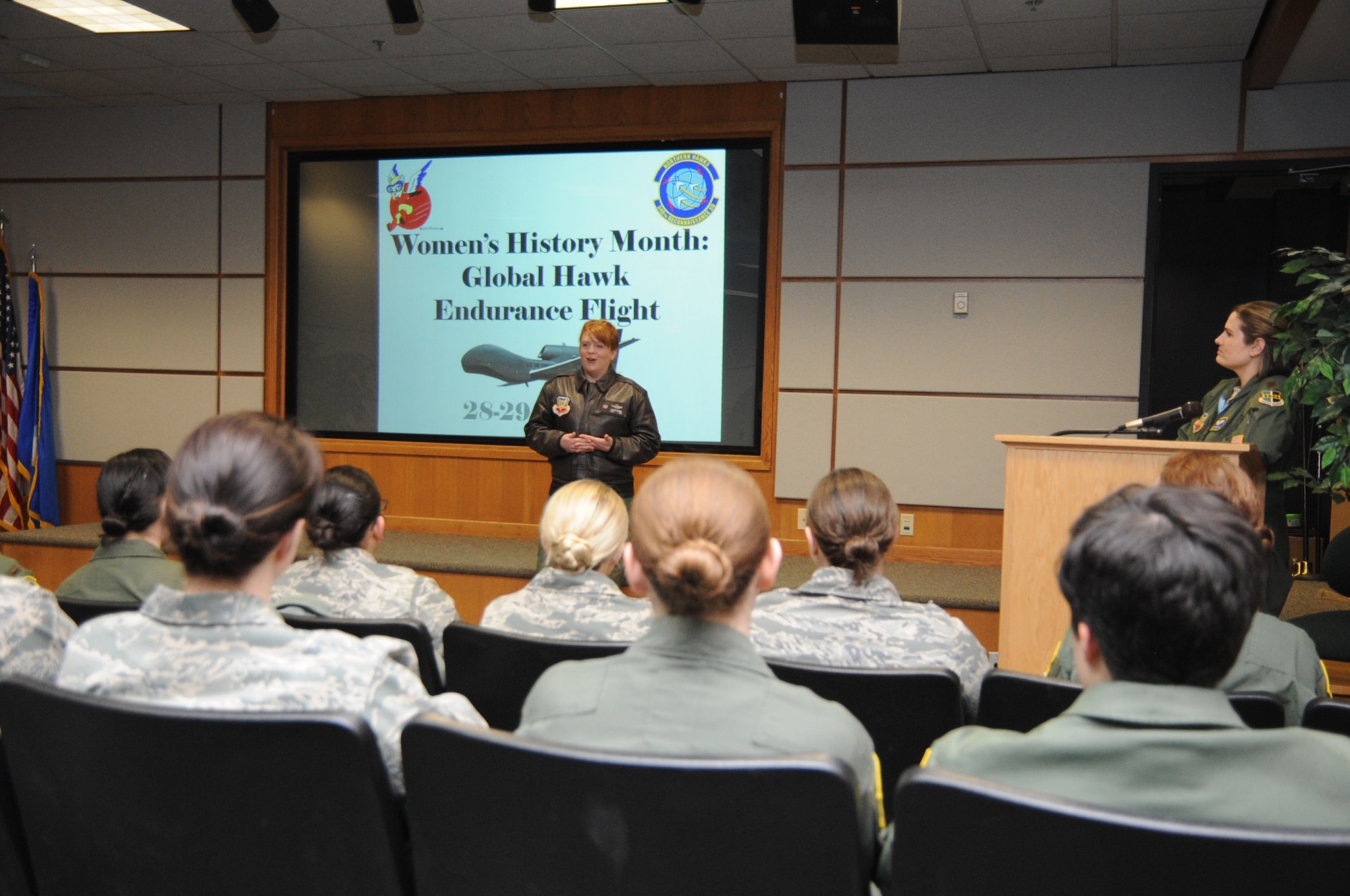 Lt. Col. Amanda Brandt, 348th Reconnaissance Squadron commander, speaks to women of the 348th RS and 319th Air Base Wing during a pre-mission brief March 27, 2014, on Grand Forks Air Force Base, N.D. The mission was for an endurance flight of the RQ-4 Global Hawk to be manned entirely by female Airmen. (U.S. Air Force photo/Staff Sgt. David Dobrydney)