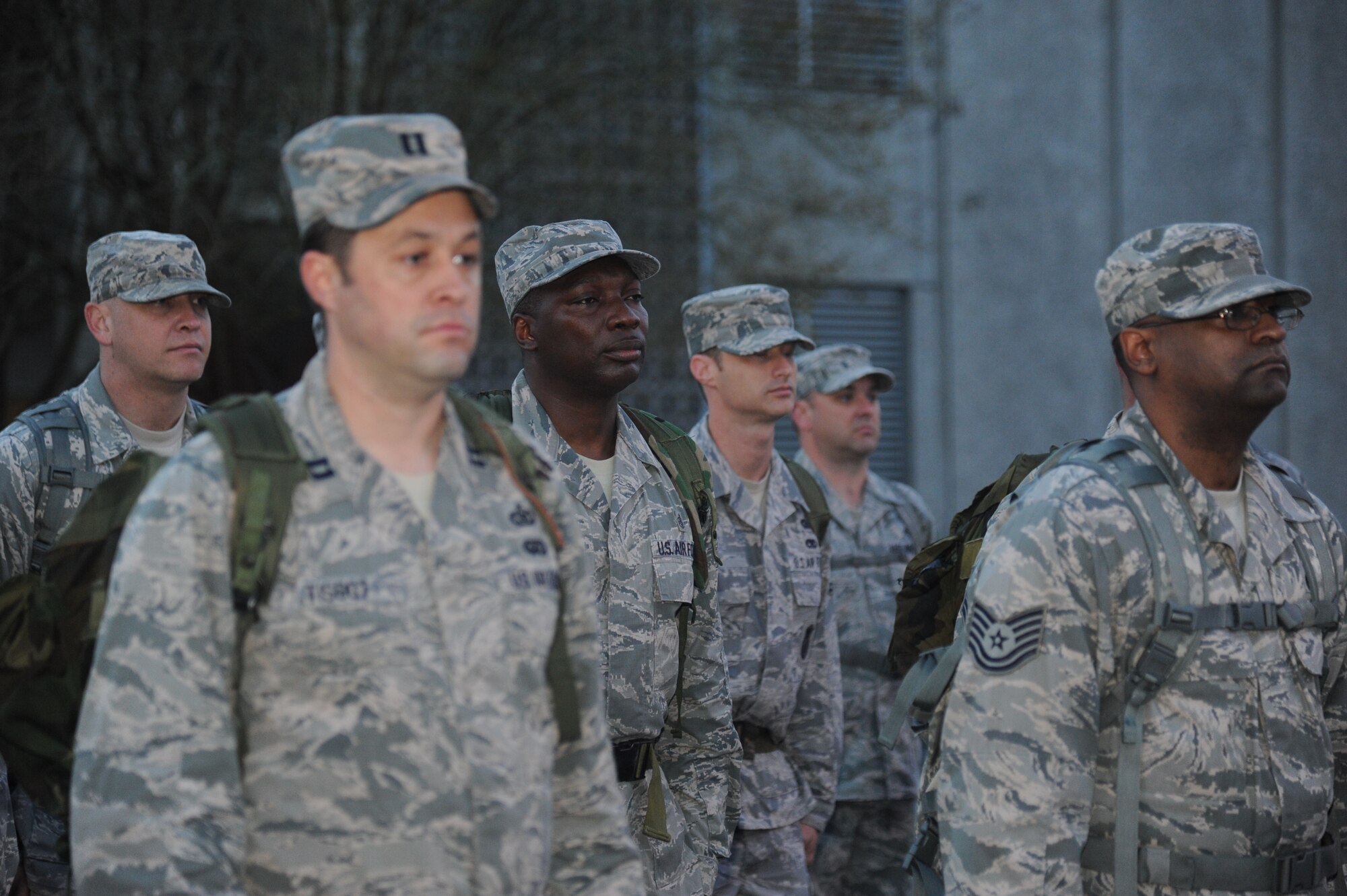 Members of the 602nd Training Group (Provisional) stand in formation as they prepare to conduct an 84-mile ruck march April 2, 2014, at Keesler Air Force Base, Miss.  The 2-day march, which began on Keesler and will end at Camp Shelby Army Post, Miss., took place to commemorate the 602nd TRG (P) mission in support of Joint Expeditionary Taskings and to their students who made the ultimate sacrifice. (U.S. Air Force photo by Kemberly Groue)