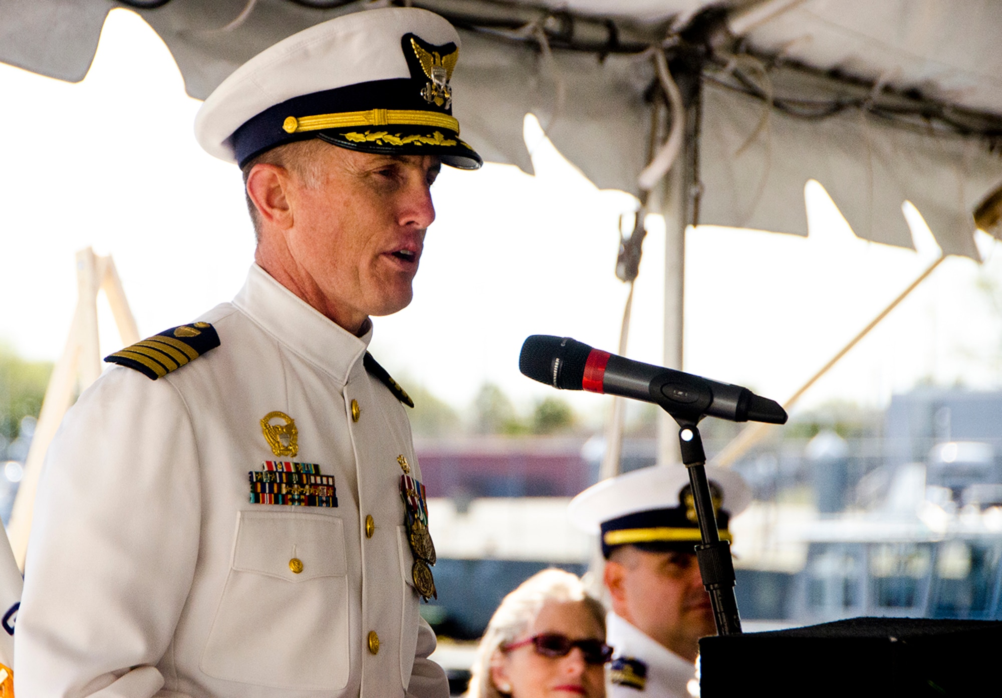 United States Coast Guard Capt. Caleb Corson, delivers the farewell address during the decommissioning ceremony of United States Coast Guard Cutter Gallatin (WHEC-721), March 31, 2014 in Charleston, S.C.  Corson served as the Gallatin's commanding officer for almost three years.  (U.S. Air Force photo/ Staff Sergeant Aaron Thomasson)