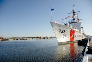 United States Coast Guard Cutter Gallatin (WHEC-721), rests at anchor before its decommissioning ceremony March 31, 2014, in Charleston, S.C.  The Gallatin was commissioned in 1968 and served for 45 years.  (U.S. Air Force photo/ Staff Sgt. Aaron Thomasson)