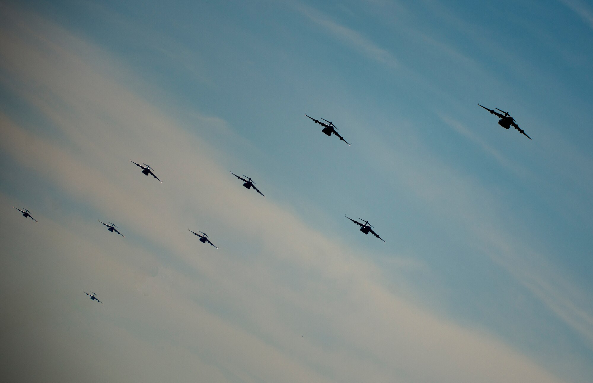 Nine C-17 Globemaster III aircraft perform a large formation exercise March 27, 2014, at Joint Base Charleston, S.C. The large formation exercise provided more than 500 operational and maintenance training objectives and demonstrated the U.S. Air Force's strategic capability. (U.S. Air Force photo/ Senior Airman Dennis Sloan)