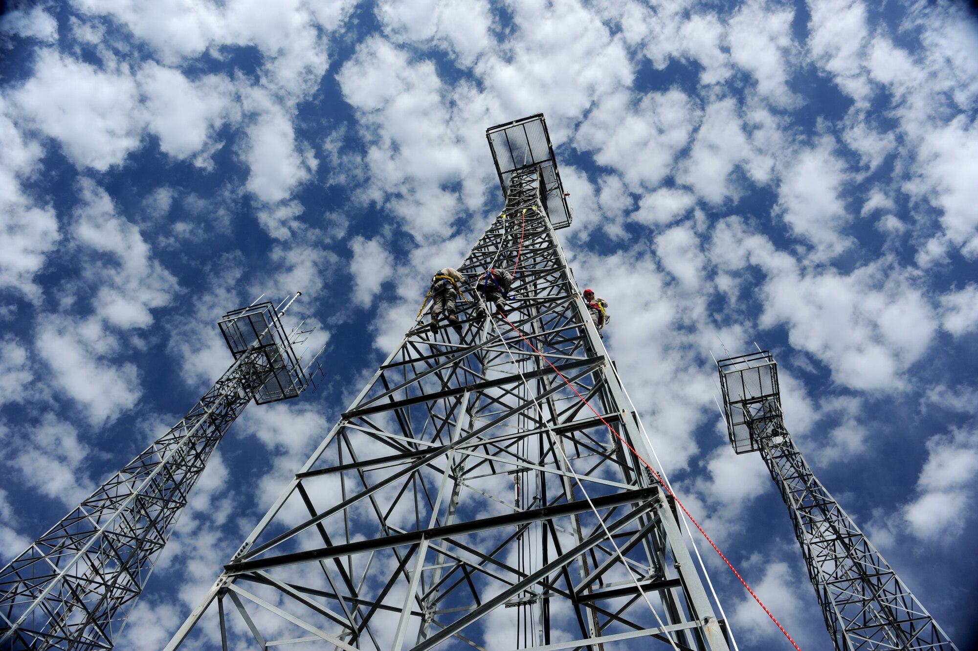 Airmen from the 19th Communications Squadron climb a radio tower March 14, 2014, at Little Rock Air Force Base, Ark. Airmen from the 19th CS participate in annual climbing training to maintain proficiency and certifications. (U.S. Air Force photo by Airman 1st Class Scott Poe)   